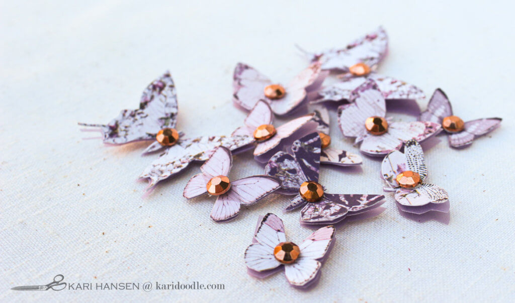 a flock of lavender paper butterflies