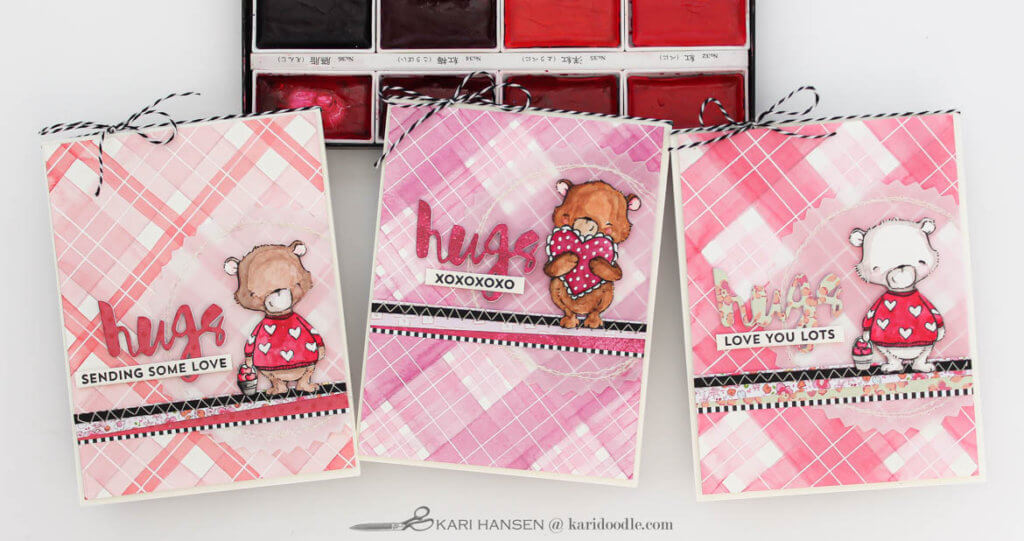 cards with watercolor tartan backgrounds and bear embellishments