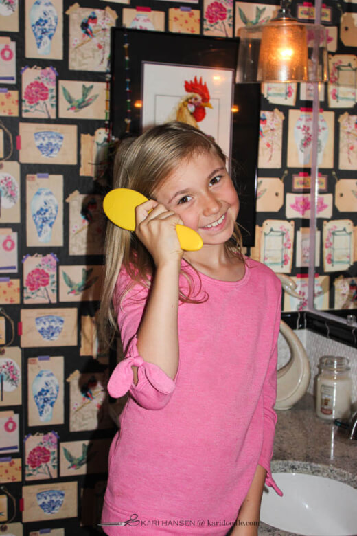 girl brushing her hair