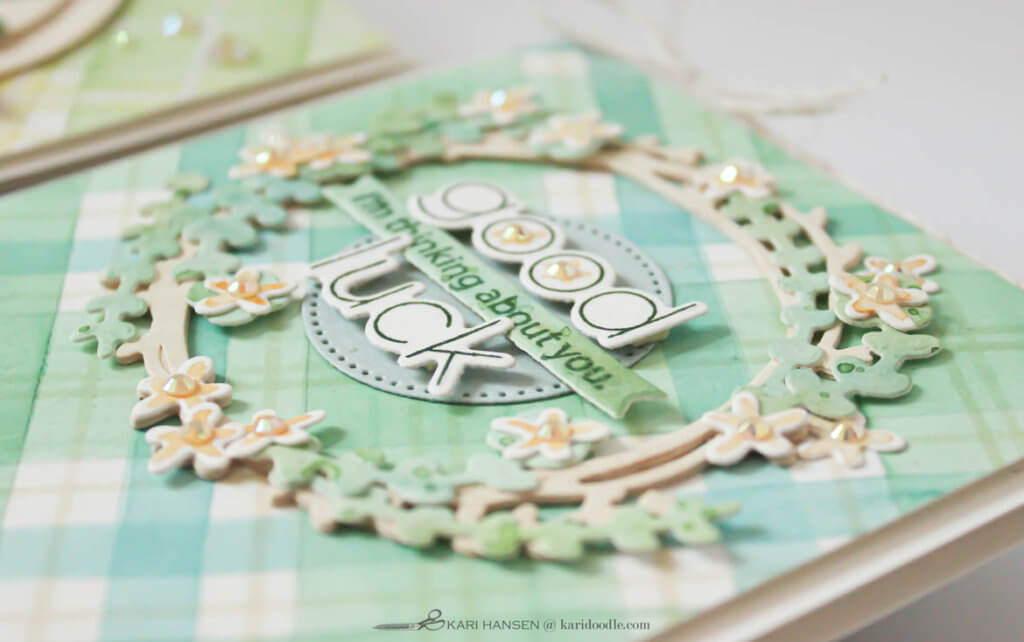 wreath embellishment on green tartan card